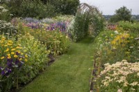 A view across the cut flower beds and sweet pea arch at Cotswold Country Flowers.
