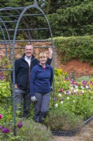 Bryan and Joanne Drew in the walled flower garden.