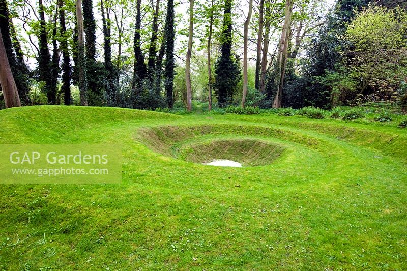 Spiral turf land sculpture at Blakenham Woodland Garden, Suffolk
