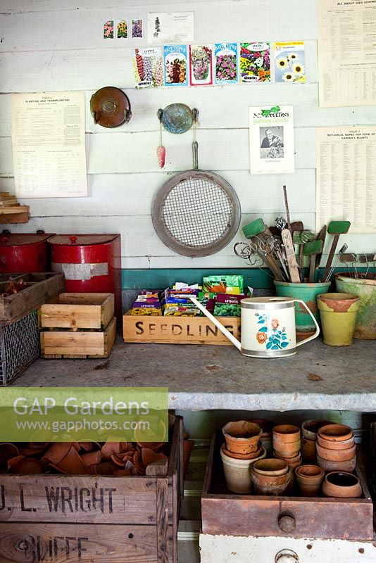 Old potting shed with seed boxes, pots and seed pakets - Trevoole Farm, Cornwall.