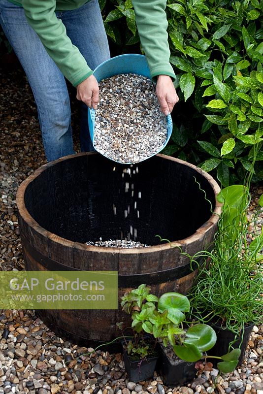 Creating a water feature - adding gravel to base of wooden barrel