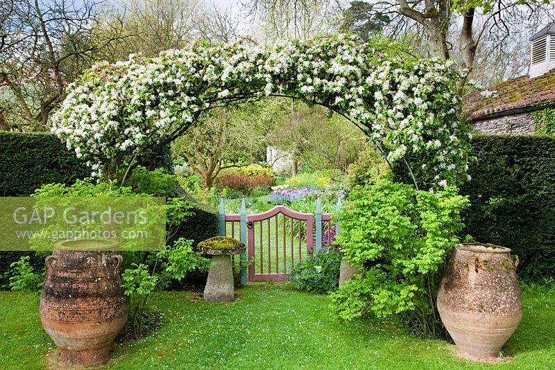 The Cottage Garden with apple blossom, Highgrove Garden, May 2009. 
