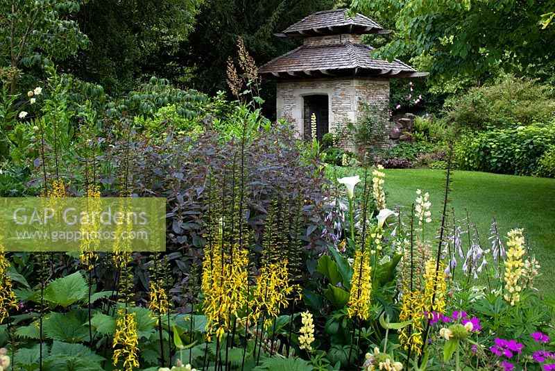 The Cottage Garden with the Jodphur Gate, Highgrove Garden, June 2011. 