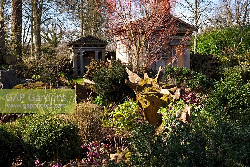 Two green oak temples in the The Stumpery, Highgrove Garden, March 2011. The Stumpery is based on a Victorian conceptfor growing ferns amongst tree stumps.  