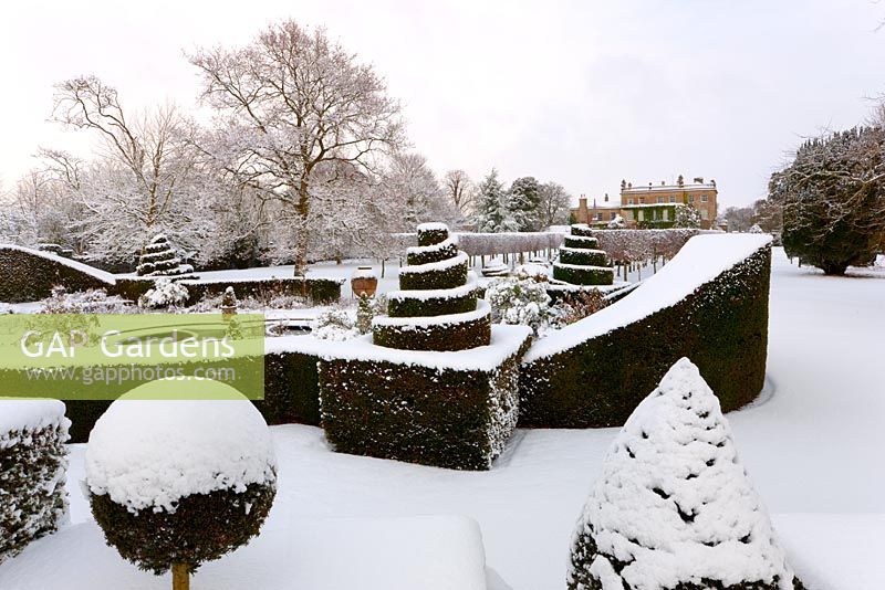 The west front and topiary in snow, Highgrove, January 2010.