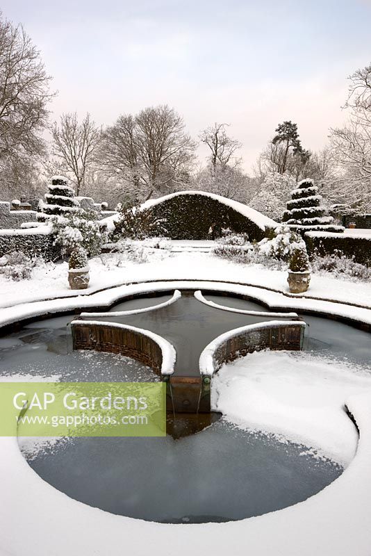 Mediterranean garden and lilly pool in snow, Highrove Garden, January 2010. 