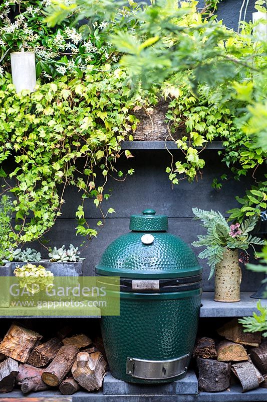 The Big Green Egg company barbecue in Abigail Ahern designed Hackney garden. London