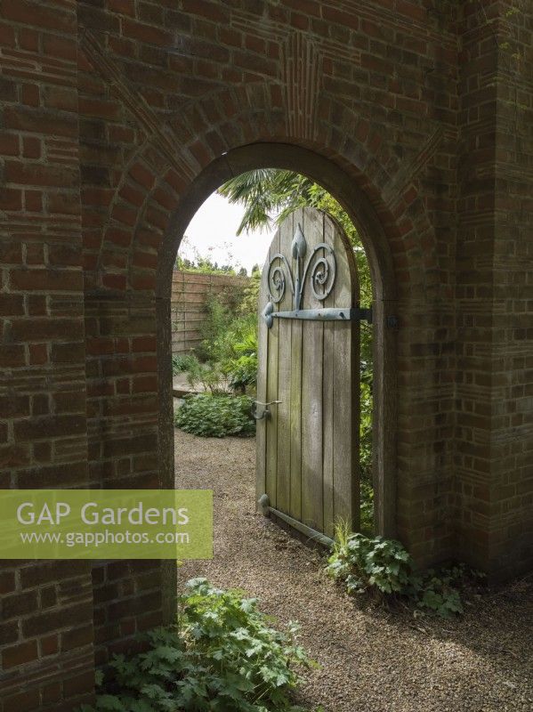Doorway and arch to the walled Mediterranean Garden at East Ruston Old Vicarage Gardens