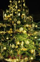 Christmas tree decorated with gold at The Chelsea Gardener in London