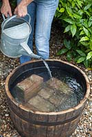 Creating a water feature - adding water to wooden barrel