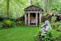 The Stumpery with one of the two temples and a statue 'Goddess of the Woods' - Highgrove Garden, May 2008.