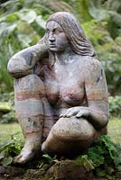Sculpture of a Wood Nymph, the goddess of the woods, in the Stumpery. Highgrove Garden, August 2007. 