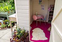 Garden shed used as childrens playhouse