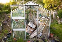 Neglected greenhouse in need of renovation