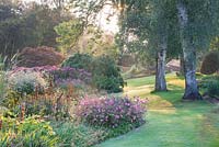 The Dell Garden, Bressingham at first light in September. Bressingham Gardens, Norfolk, UK.