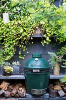 The Big Green Egg company barbecue in Abigail Ahern designed Hackney garden. London