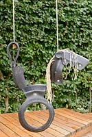 Child's horse swing made from cut up tyres
