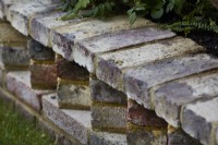 Detail of wall built with handmade low carbon bricks.