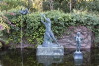 Three statues in pool at the edge of the Sunken Garden.