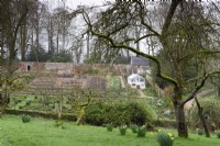 View down into the walled garden at Cerney House Gardens in spring