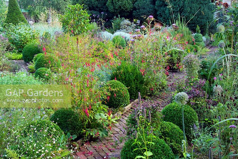 Formal vegetable garden in late summer at Lower House, Powys in Wales