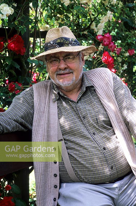 Peter Beales in his rose garden