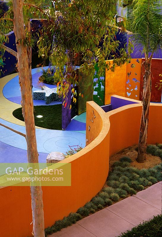 Contemporary childrens Garden with colourful playarea  