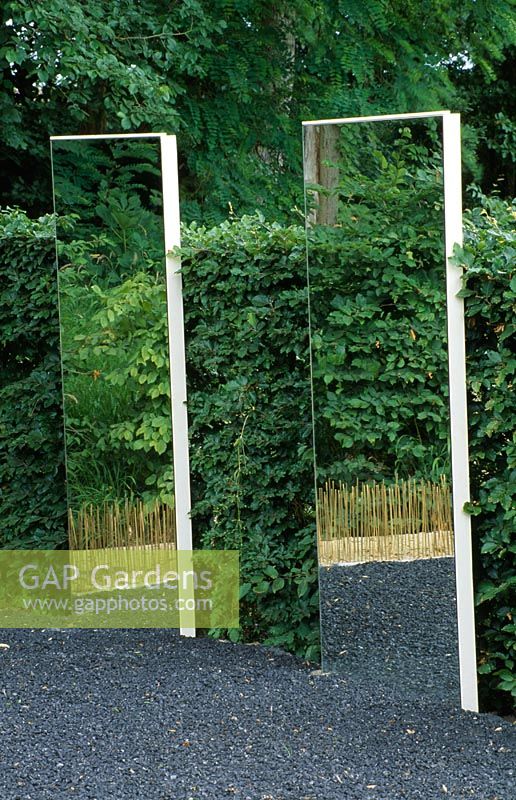 Black gravel, hedges and mirrors in the pampas garden - The 10th festival International des Jardins, Chaumont-sur-Loire, France 2001 