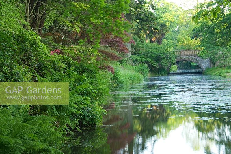 Bridge over the river running through the garden at Minterne, Minterne Magna, Dorchester, Dorset