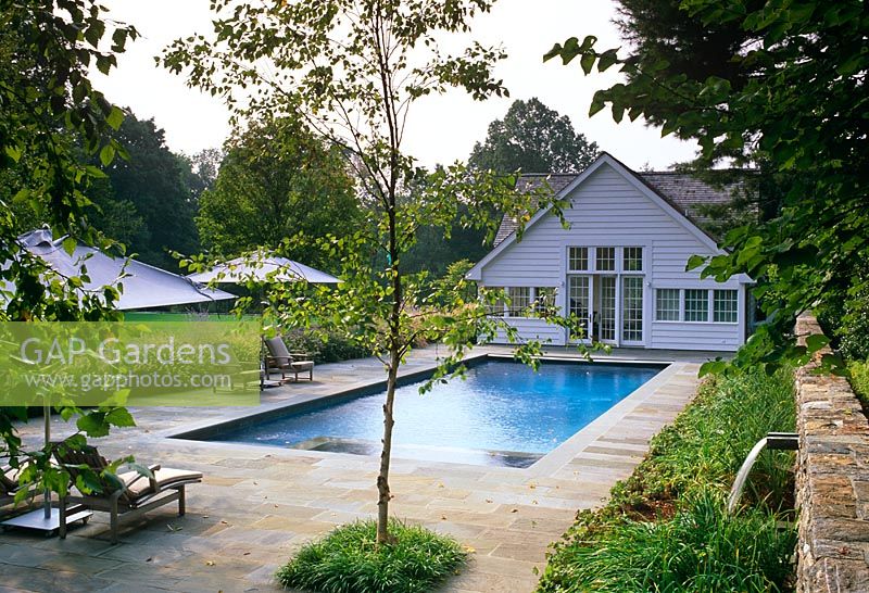 House with swimming pool and wall with waterfall - The Odrich Garden, Greenwich, Connecticut USA