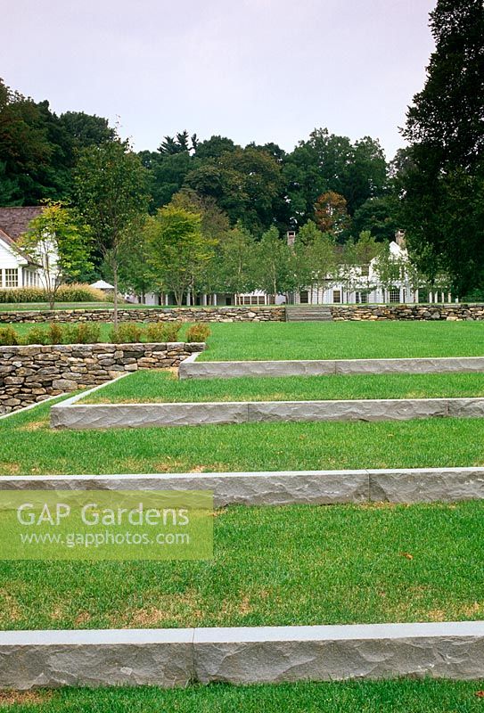 Shallow contemporary steps in grass lawn  
- The Odrich Garden, Greenwich, Connecticut USA