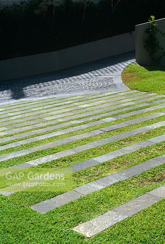 Contemporary paving with concrete strips in grass - Wentworth Road, Vaucluse, NSW, Australia
