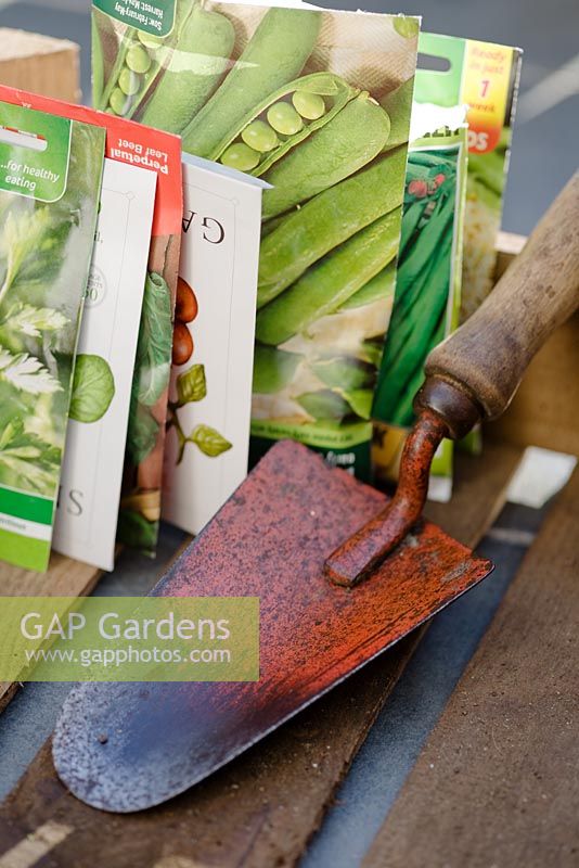 Hand trowel with vegetable seed packets