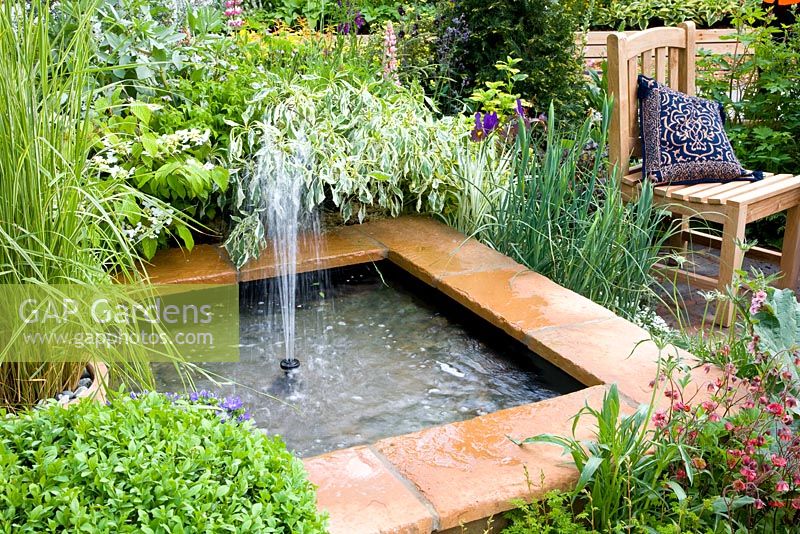 Pond with fountain - Garden - Real Life by Brett, Design - Geoffrey Whiten, Sponsor - Brett Landscaping and Building Products - RHS Chelsea Flower Show 2008
 