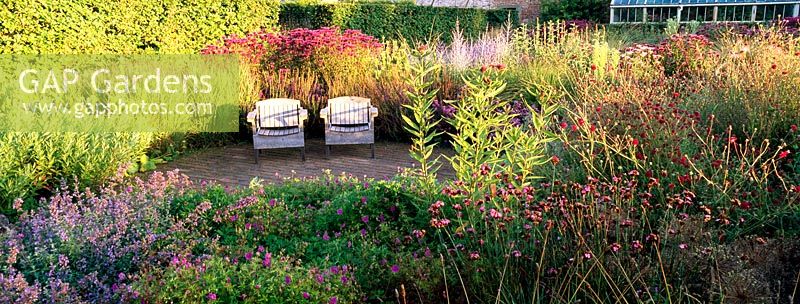 Seating area in The Perennial Meadow at Scampston Hall designed by Piet Oudolf
