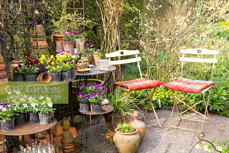 Terrace in Spring with chairs and pots