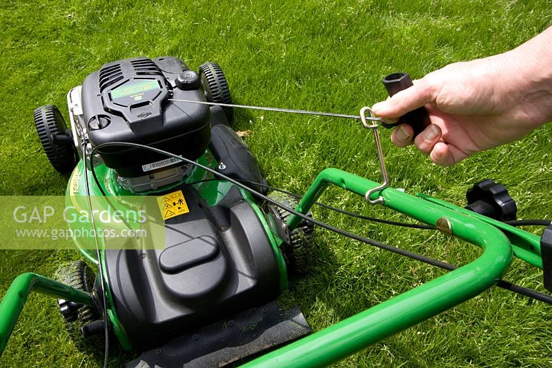 Mowing with a rotary mulching mower.
