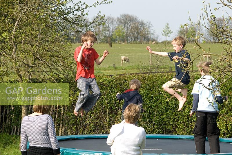 Children on a garden trampoline 