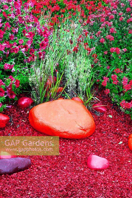 'Seeing Red' garden with dyed red bark chippings - International Gardens Festival, Chaumont-sur-Loire, France