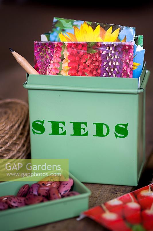 fairtrade seed tin with seed packets, garden string and Runner bean seed 'Prizewinner stringless'