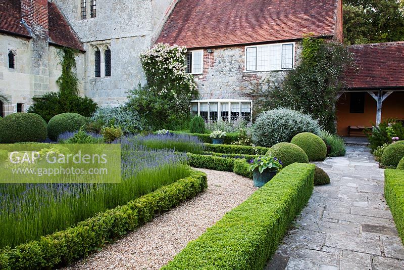 Formal parterre with clipped Box and Lavandula - Rymans, Sussex