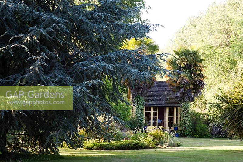 Formal country garden with Summerhouse on lawn - Rymans, Sussex