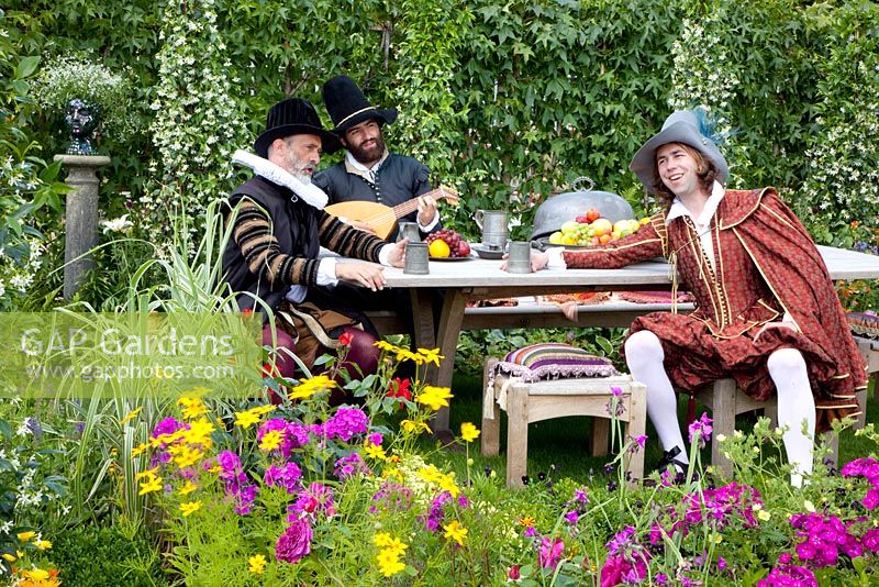 Actors in costume in the 'The Taming of the Shrew' garden - Silver Medal winner - RHS Hampton Court Flower Show 2010 