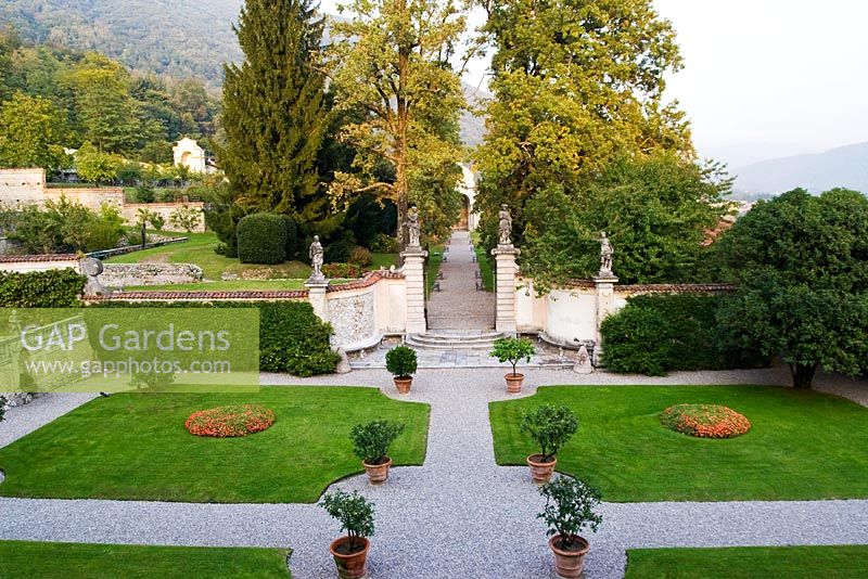 View from Villa onto Parterre and view of the Secret Garden - Villa Della Porta Bozzolo, Casalzuigno, Italy 