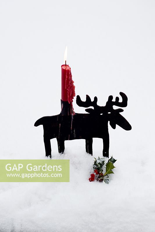 Snowy 'Moose' candlestick with light candle and Holly