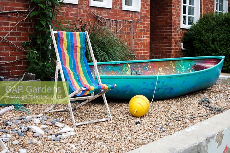 Seaside themed garden with colourful deckchair and boat - Palatine Primary School, Worthing