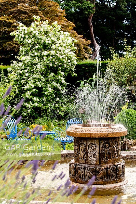 Sunken garden with water fountain - Kiftsgate Court Garden, Chipping Campden, Gloucestershire, UK