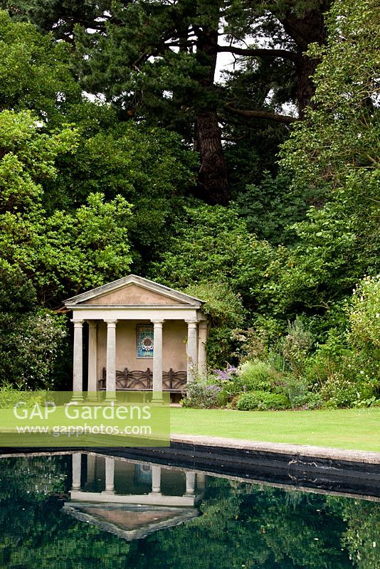 The north borders and scotch firs - Kiftsgate Court Garden, Chipping Campden, Gloucestershire, UK