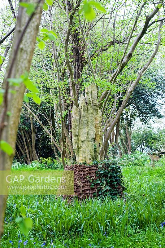 Wood sculpture at Blakenham Woodland Garden, Suffolk