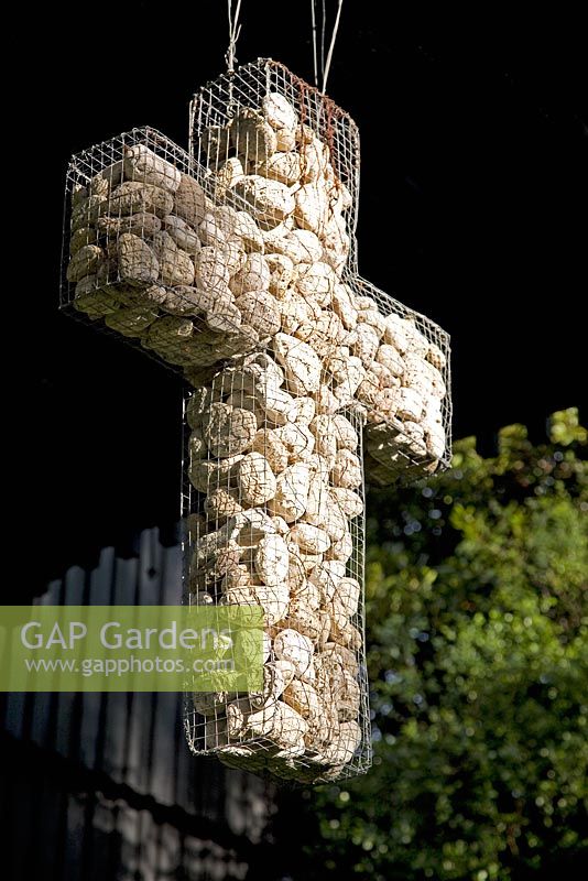 Sculpture by the garden owner, Kathy Johnston. Made from chicken wire infilled with volcanic pumice